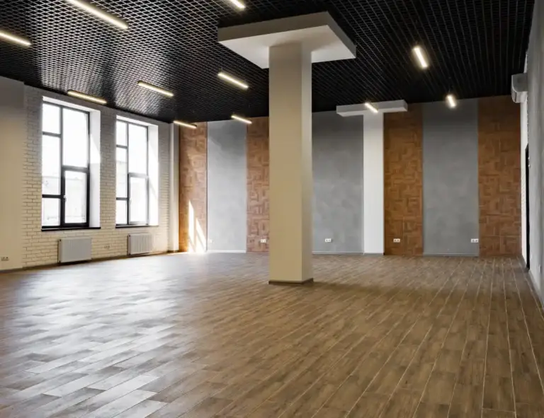 empty open space office room with window 2025 02 24 12 27 56 utc e1767010943722